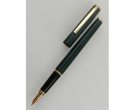 A Sheaffer fountain pen, having gold plated details.