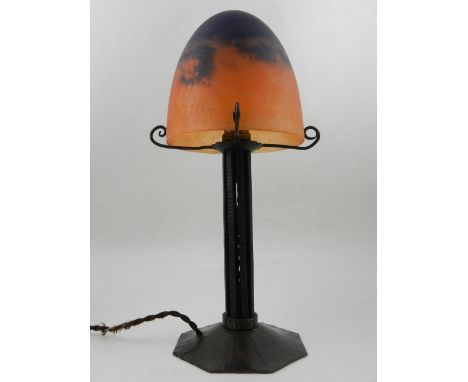 Daum, Nancy, France. An Arts and Crafts style table lamp, having domed glass shade, signed. H.34cm