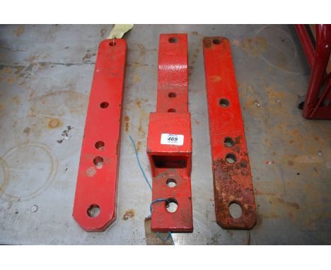 A tractor pick up bar and draw bar.