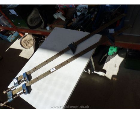 A pair of sash clamps. Approx 42" long.