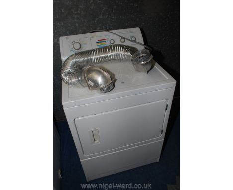 An industrial Whirlpool dryer with vent pipe (30 amp power required).