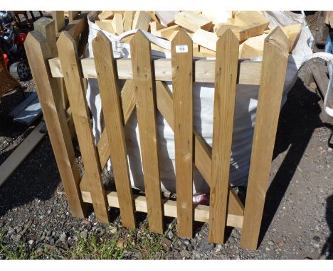 A single wooden gate, approx. 36" wide x 36" high.