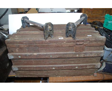 A banded pine travel trunk and a pair of rests 35" x 18" x 18".