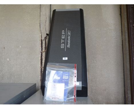Reebok fitness stepper with instruction manual and CD.