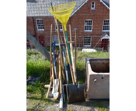 A quantity of garden tools including; shovel, spade, rake, etc.