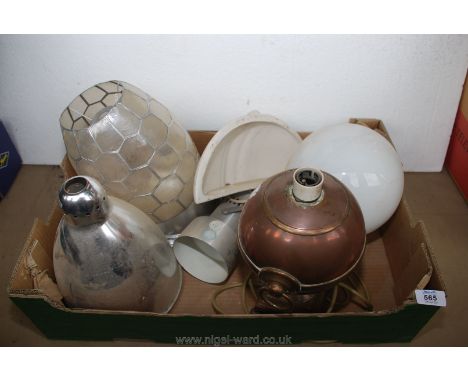 A box of various light fittings and shades.
