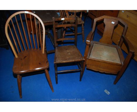 A stick back kitchen chair, ladder back chair and commode chair complete with pot.