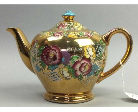SADLER PART TEA SERVICE,with floral decoration on a gilt ground, along with other items including a miniature mantel clock, a