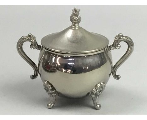 THREE PIECE SILVER PLATED TEA SERVICE,along with other plated items including an oval tray, goblets, napkin rings and dishes