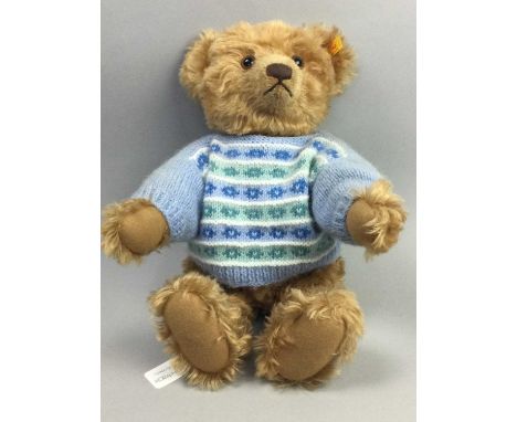 SEVEN MODERN STEIFF TEDDY BEARS,with knopf im ohr tags, lacking boxes and certificates, includes three year bears with medals