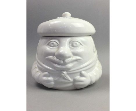 NOVELTY LIDDED BISCUIT JAR,19cm high, along with a composite figure of a horse, another of a female and a ceramic figure of a