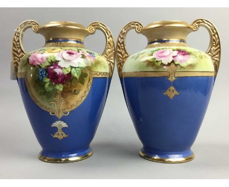 PAIR OF NORITAKE TWIN-HANDLED VASES,painted with roses, 27.5cm high, along with a Carlton Ware rouge Royale vase (3)