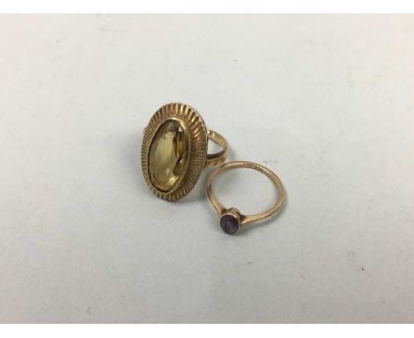 TWO GEM SET RINGS,including amethyst and citrine