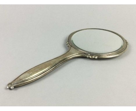 CONTINENTAL SILVER BACKED HANDMIRROR,along with a trinket box stamped 800 to base, a compact, a twin handled basket and other