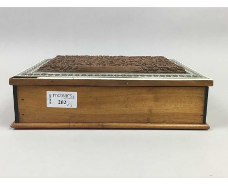 EASTERN CARVED WOOD AND BONE CASKET,the hinged lid carved with an architectural and floral panel, 25.5cm wide, along with a r
