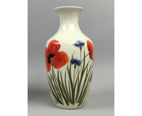TWO CONTEMPORARY ITALIAN CERAMIC VASES,decorated with poppies, the taller measuring 25.5cm high, along with another vase (3)