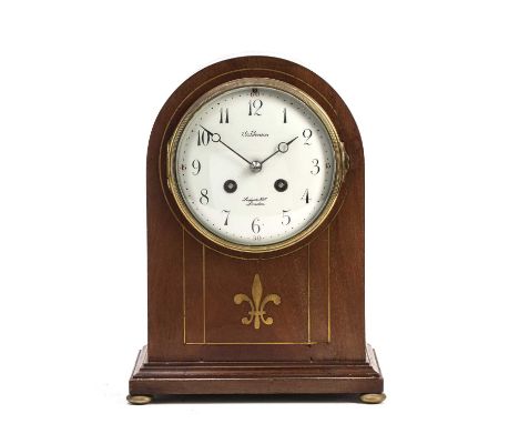 An Edwardian mahogany mantel clock with convex white enamel Arabic dial signed Benson, Ludgate Hill, London, marti twin train