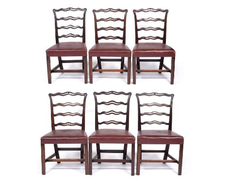 A set of six Chippendale style mahogany ladder back dining chairs with red leather seats, 53cm wide x 44cm deep x 92cm highSo