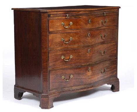 A George III mahogany serpentine chest of four long graduated drawers having brass swan neck handles a brushing slide and rai