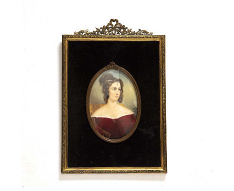 Attributed to Maximilian Stieler.An oval miniature half length portrait of a young woman wearing a red dress, watercolour on 