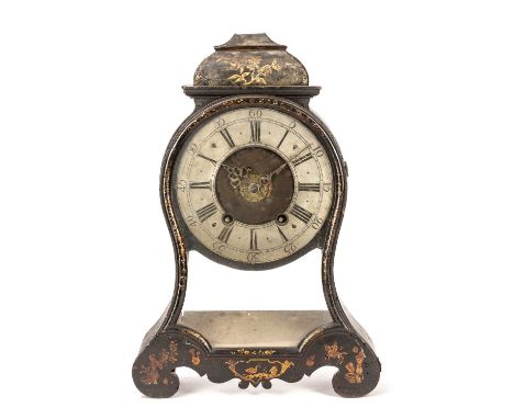 A late 18th/early 19th century French black japanned bracket clock with silvered Roman chapter ring, Arabic five minutes and 