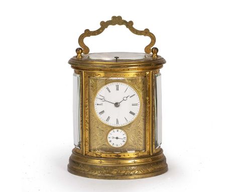 A 19th century French oval gilt brass carriage clock, the circular white enamel Roman dial over a subsidiary alarm dial and w
