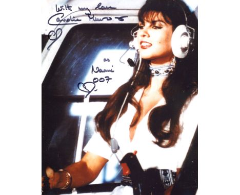 007 James Bond 8x10 The Spy Who Loved Me photo signed by Bond girl Caroline Munro.  Good condition. All autographs come with 