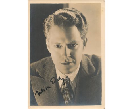 Nelson Eddy signed 7x5 vintage sepia photo with original MGM studios personalised mailing envelope dated 28 Jan 1937. Nelson 