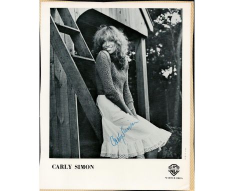 Carly Simon signed 10x8 Warner Bros black and white promo photo. Carly Elisabeth Simon (born June 25, 1945) is an American si