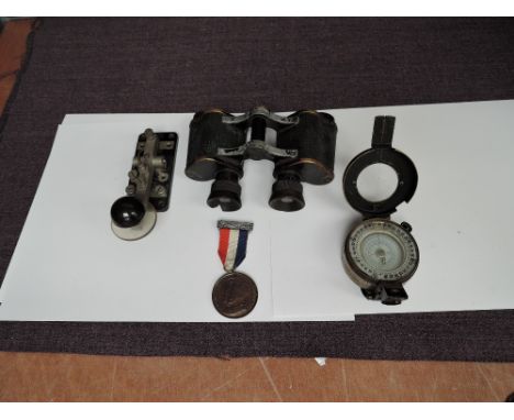 A pair of Bausch and Lomb Zeiss Prism Stereo 8x25 Binoculars, a Morse Code Key having bakelite base marked on reverse P.T &am