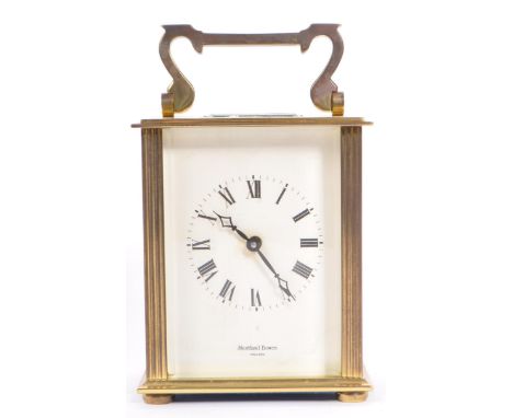 Shortland Bowen - An early 20th century circa 1940s brass carriage clock having bevelled glass panels to each side with swan 