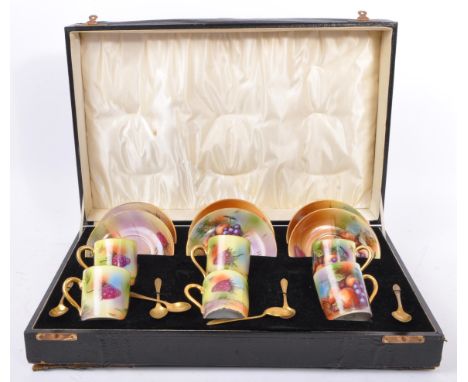 A 20th century cased porcelain coffee service in the style of Royal Worcester Evesham / Aynsley Harvest Gold. Comprising of s