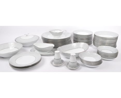 An extensive vintage Damask pattern dinner service by Noritake. Consisting of dinner plates x 9, side plates x 19, soup bowls