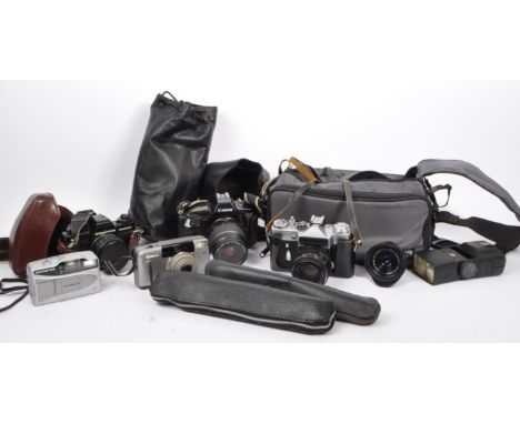 A collection of vintage 20th century and later cameras, lenses and photographic accessories. To include, Praktica BCA electro