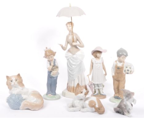 Nao for Lladro - Hand made in Spain - A collection of seven porcelain china tableware figurines. Comprising of, a girl with u