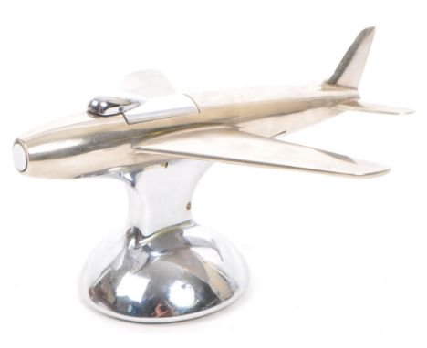 Dunhill - A vintage mid 20th century circa 1950s Dunhill chrome table lighter in the form of a Sabre jet suspended upon a cir