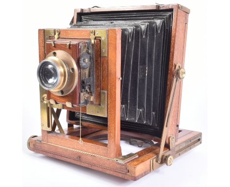 A 19th century likely German made folding bellows camera. Mahogany construction, fitted with a CP Goerz Anastigmat F=125mm 1: