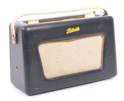 A Roberts portable transistor radio model number R500 / Serial Number 5537 with black case and swivel base and gold coloured 