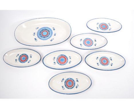 A set of seven continental Italian ceramic fish serving dishes in oval form. The&nbsp;set each with hand painted circular abs