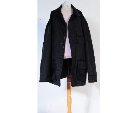 Yves Saint Laurent - A vintage designer 20th century Yves Saint Laurent YSL men's gents waterproof jacket. The jacket having 