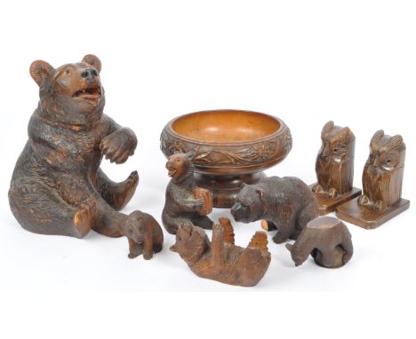 A collection of vintage 20th century German Bavarian black forest carved wood items. Comprising of bear figurines / lidded ja