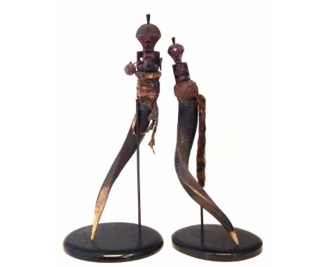 Two Songye horn topped Nkisi power figures, 71cm high.    All lots in this Tribal and African Art Sale are sold subject to V.