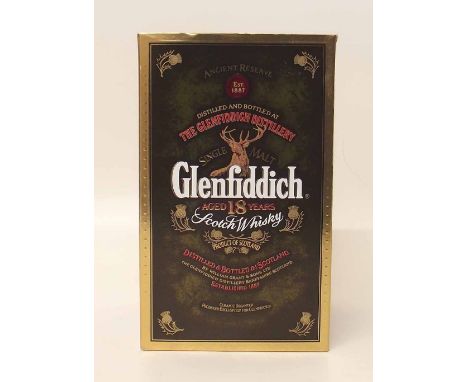 Glenfiddich 18 year old Whiskey in ceramic flask and original box. Condition report: see terms and conditions