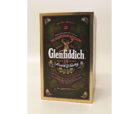 Glenfiddich 18 year old Whiskey in ceramic flask and original box. Condition report: see terms and conditions