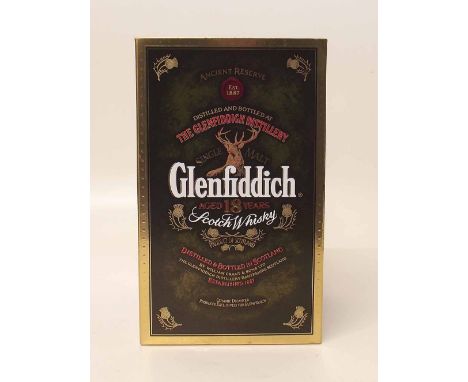 Glenfiddich 18 year old Whiskey in ceramic flask and original box. Condition report: see terms and conditions