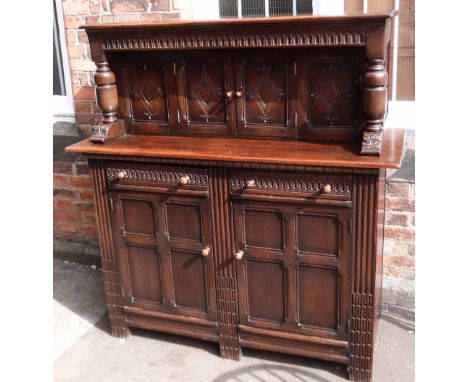 Ercol style court cupboard. Condition report: see terms and conditions