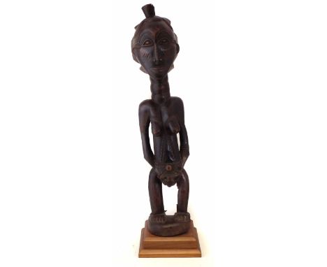Songye female figure, 91cm high     All lots in this Tribal and African Art Sale are sold subject to V.A.T. Therefore £100 ha