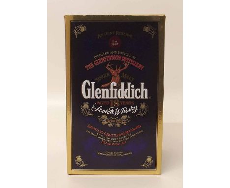 Glenfiddich 18 year old Whiskey in ceramic flask and original box. Condition report: see terms and conditions