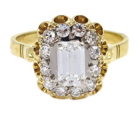 18ct gold emearld and round brilliant cut diamond ring, stamped 750, central baguette diamond approx 0.8 carat