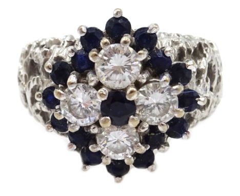 White gold diamond and sapphire cluster ring, with openwork shoulders, stamped 18ct, diamonds approx 0.5 carat Condition Repo